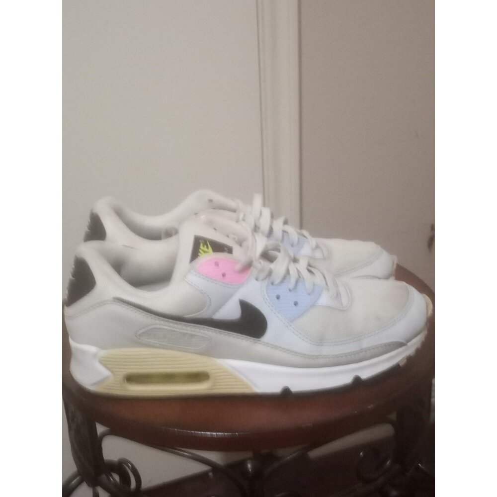 Nike Women's White Sneakers with Black Swoosh and Pastel Accents